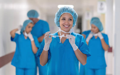 nurse getting out of operating room and removing mask nurse getting out of operating room and removing mask